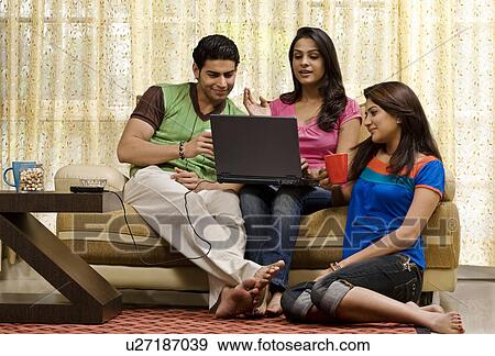 Stock Photo - Friends having a great time. Fotosearch