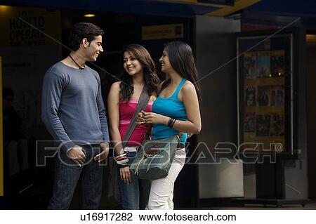 Stock Image - Friends talking. Fotosearch