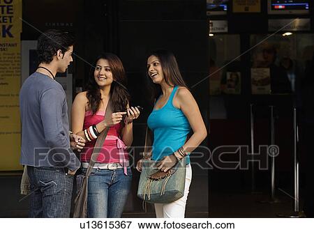 Friends talking View Large Photo Image Stock Photo - Friends talking. Fotosearch