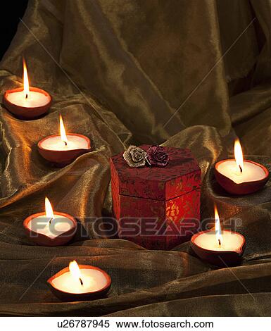 Gift box and diyas View Large Photo Image Stock Photography - Gift box and diyas. Fotosearch
