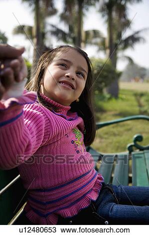 Girl in a park View Large Photo Image Stock Image - Girl in a park. Fotosearch