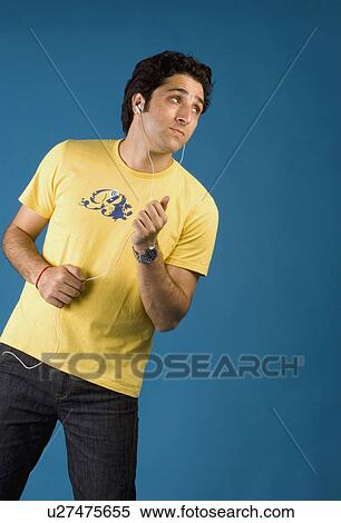 Stock Photography - Man listening to music. Fotosearch