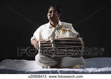 Man playing the tabla View Large Photo Image Stock Photography - Man playing the tabla. Fotosearch