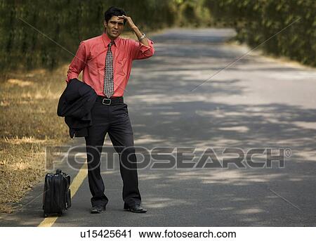 Stock Image - Man waiting. Fotosearch