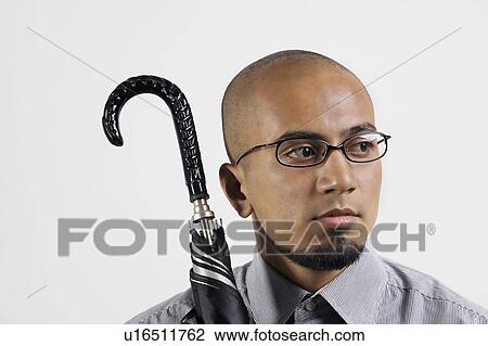 Man with an umbrella View Large Photo Image Stock Image - Man with an umbrella. Fotosearch