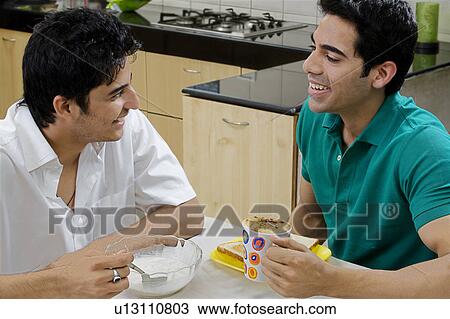 Men having breakfast View Large Photo Image Stock Image - Men having breakfast. Fotosearch