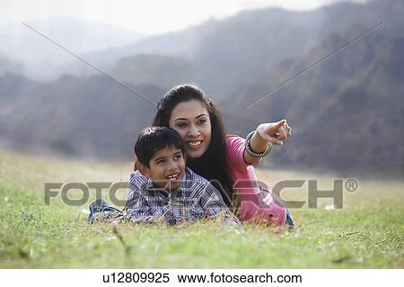 Mother and son in a park View Large Photo Image Stock Photography - Mother and son in a park. Fotosearch
