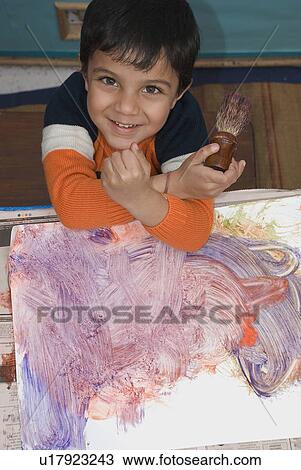 Portrait of a young boy View Large Photo Image Stock Image - Portrait of a young boy. Fotosearch
