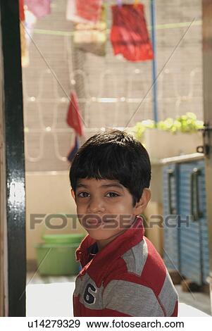 Stock Photo - Portrait of young boy. Fotosearch