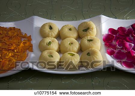 Sweets and flower petals View Large Photo Image Picture - Sweets and flower petals. Fotosearch