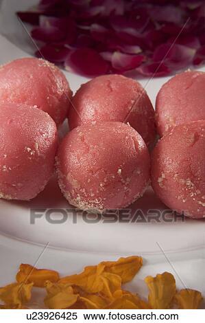Stock Photography - Sweets and flower petals. Fotosearch