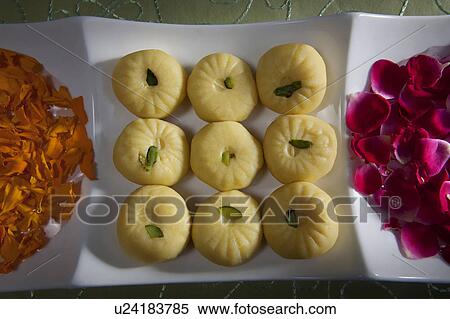 Sweets and flower petals View Large Photo Image Stock Photography - Sweets and flower petals. Fotosearch