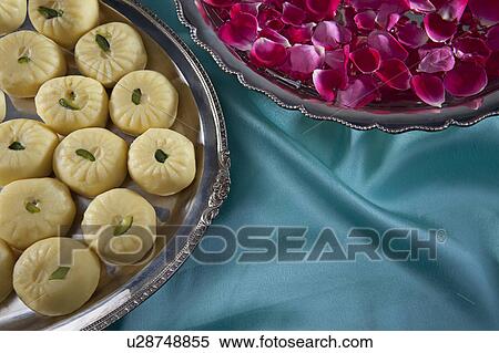 Sweets and flower petals View Large Photo Image Stock Photography - Sweets and flower petals. Fotosearch