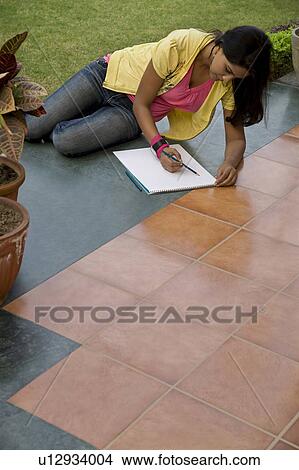 Picture - Woman drawing. Fotosearch