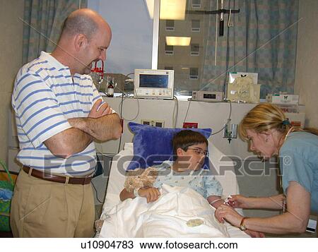 A boy prepares for surgery. View Large Photo Image Stock Image - A boy prepares for surgery.. Fotosearch