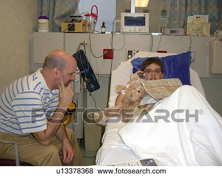A boy prepares for surgery. View Large Photo Image Stock Photo - A boy prepares for surgery.. Fotosearch