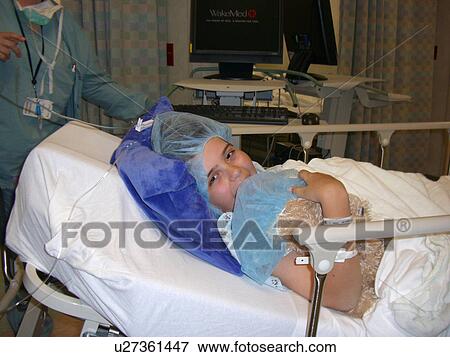 Stock Photo - A boy prepares for surgery.. Fotosearch