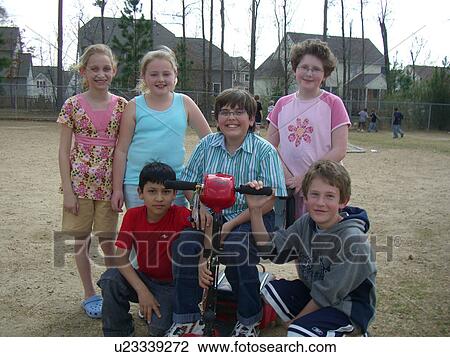A group of friends huddle together during recess. View Large Photo Image Stock Image - A group of friends huddle together during recess.. Fotosearch