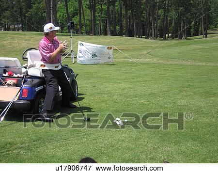 A man displays how he plays golf. View Large Photo Image Stock Photo - A man displays how he plays golf.. Fotosearch