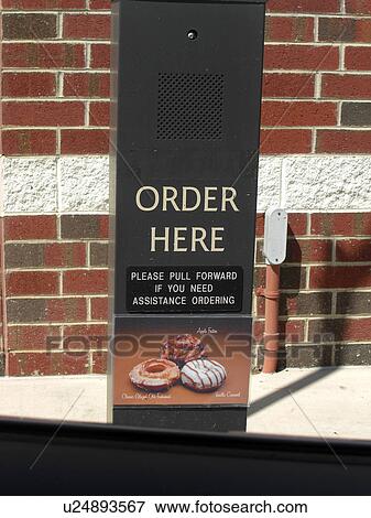 Assistance if needed at a fast food restaurant. View Large Photo Image Stock Photo - Assistance if needed at a fast food restaurant.. Fotosearch