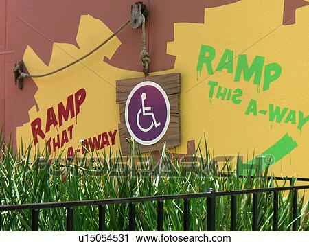 Stock Image - Handicap line sign at an amusement park.. Fotosearch