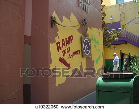 Stock Image - Handicap line sign at an amusement park.. Fotosearch