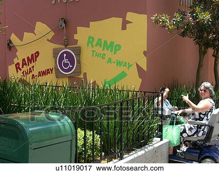 Stock Photo - Handicap line sign at an amusement park.. Fotosearch