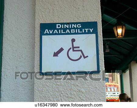 Handicap seating sign in a restaurant. View Large Photo Image Stock Image - Handicap seating sign in a restaurant.. Fotosearch