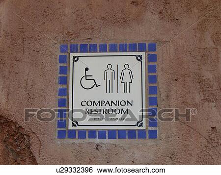 Sign for a companion bathroom. View Large Photo Image Stock Photograph - Sign for a companion bathroom.. Fotosearch