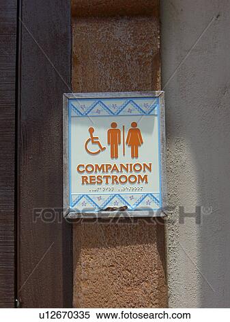 Sign for a companion bathroom. View Large Photo Image Stock Photography - Sign for a companion bathroom.. Fotosearch