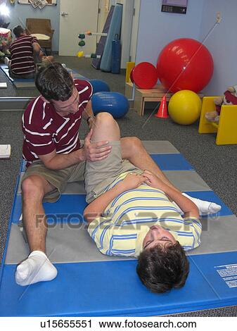 Stock Image - Stretches for physical therapy.. Fotosearch