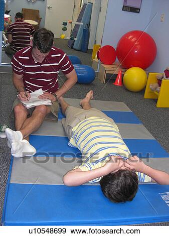 Stock Photo - Stretches for physical therapy.. Fotosearch