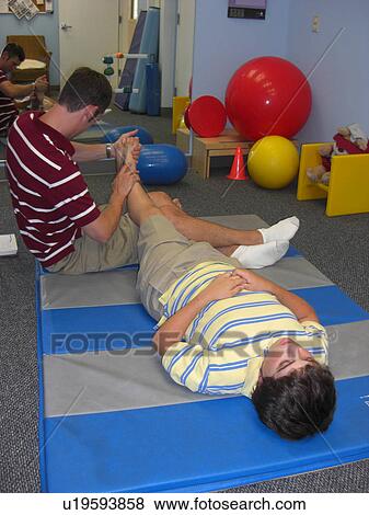 Stock Photo - Stretches for physical therapy.. Fotosearch