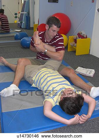 Stretches for physical therapy. View Large Photo Image Stock Photograph - Stretches for physical therapy.. Fotosearch
