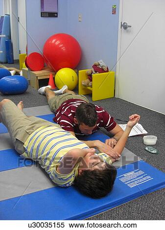 Stretches for physical therapy. View Large Photo Image Stock Photography - Stretches for physical therapy.. Fotosearch