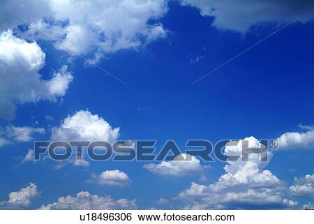 A blue sky and clouds View Large Photo Image Stock Photograph - A blue sky and clouds. Fotosearch