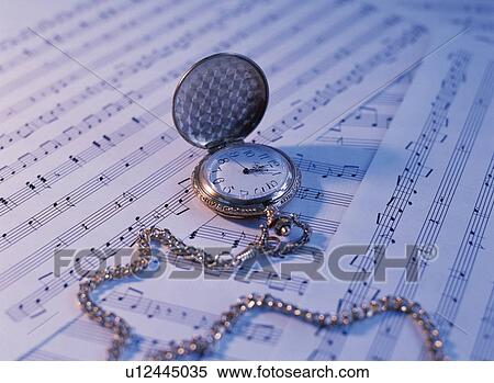 A score and a pocket watch View Large Photo Image Stock Photography - A score and a pocket watch. Fotosearch