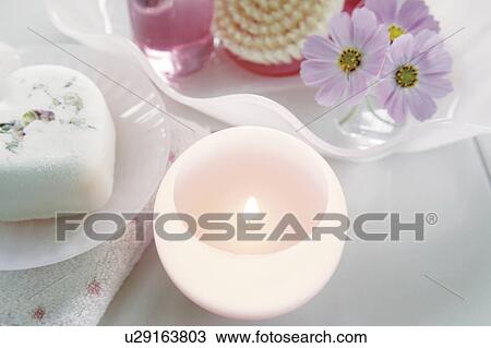Aromatherapy candle, soap and flowers View Large Photo Image Stock Image - Aromatherapy candle, soap and flowers. Fotosearch