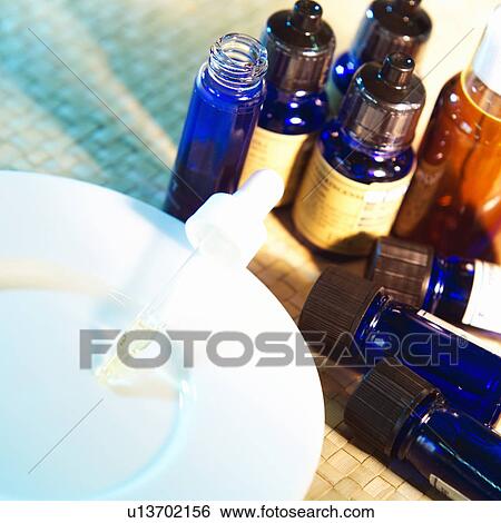 Aromatherapy oils and pipette View Large Photo Image Stock Photograph - Aromatherapy oils and pipette. Fotosearch