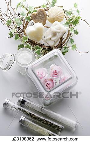 Stock Image - Bars of soap and aromatherapy salts. Fotosearch