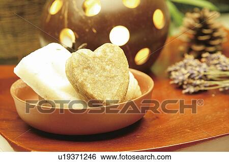 Bars of soap in container on table View Large Photo Image Stock Photograph - Bars of soap in container on table. Fotosearch