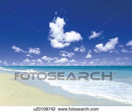 Stock Image - Beach and clouds. Oahu, Hawaii, USA. Fotosearch