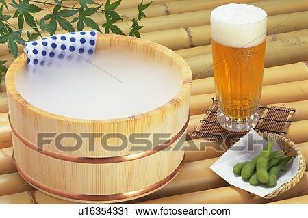 Stock Image - Beer and green soybeans. Fotosearch