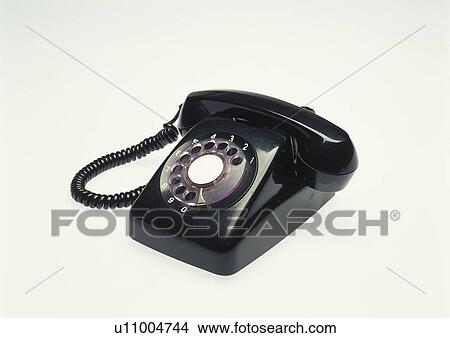 Black rotary telephone View Large Photo Image Picture - Black rotary telephone. Fotosearch