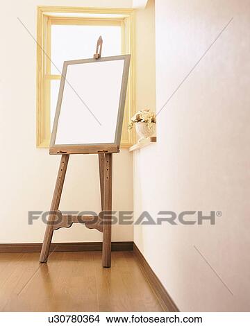 Blank artist's easel in a studio View Large Photo Image Picture - Blank artist's easel in a studio. Fotosearch