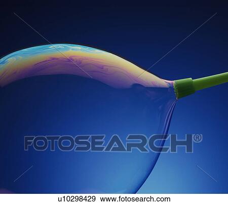 Stock Photo - Blowing a bubble. Fotosearch