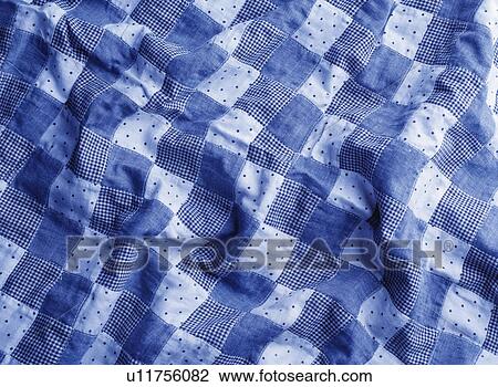 Blue and white checked quilt View Large Photo Image Stock Image - Blue and white checked quilt. Fotosearch