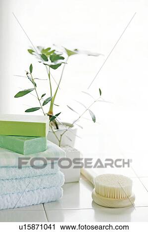 Stock Image - Body brush and soap in bathroom. Fotosearch