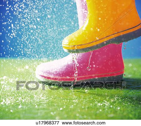Boots and rain View Large Photo Image Stock Photo - Boots and rain. Fotosearch