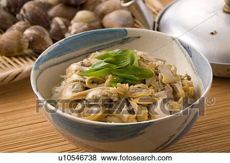 Bowl of rice cooked with clams, close up View Large Photo Image Stock Photo - Bowl of rice cooked with clams, close up. Fotosearch